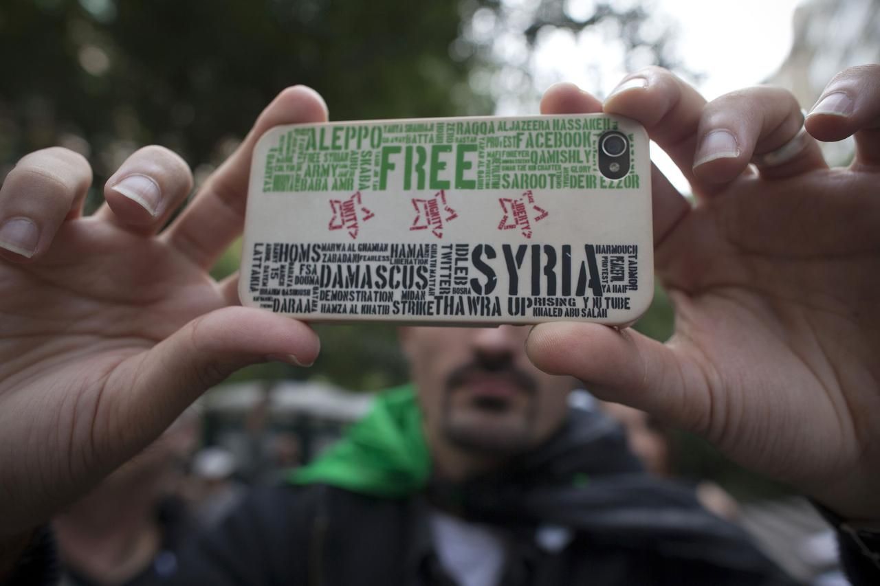 Foto: Jak loutky Ahmadínežáda a Asada křepčily u OSN v New Yorku
