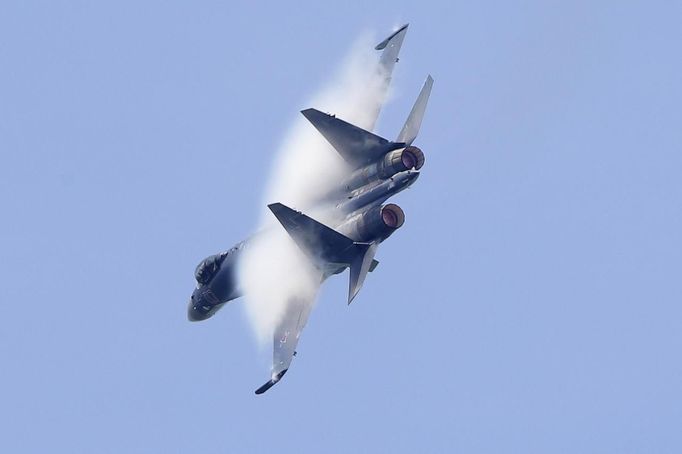 A Sukhoi Su-35 fighter takes part in a flying display, during the opening of the 50th Paris Air Show, at the Le Bourget airport near Paris, June 17, 2013. The Paris Air Show runs from June 17 to 23. REUTERS/Pascal Rossignol (FRANCE - Tags: TRANSPORT BUSINESS MILITARY)