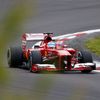 Ferrari Formula One driver Alonso takes corner during second