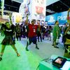 Ubisoft employees Jen Galassao (L), Kelly Koski (R) and attendee Joh Yamamoto play &quot;Just Dance 2015&quot;, a game for the Wii U and Wii, at the Nintendo booth at the 2014 Electronic Entertainment