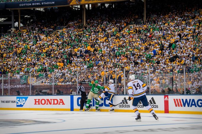 Jan 1, 2020; Dallas, Texas, USA; The Dallas Stars and the Nashville Predators face off against each other during the 2020 Winter Classic hockey game at the Cotton Bowl in