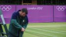 OLY-TENNIS-WIMBLEDON/ Description: Olympic hoarding is seen on Court Six of the All England Lawn Tennis Club (AELTC) as preparations are made for the London 2012 Olympic Games, in London July 9, 2012. REUTERS/Ki Price (BRITAIN - Tags: SPORT OLYMPICS TENNIS) Published: Čec. 9, 2012, 4:35 odp.