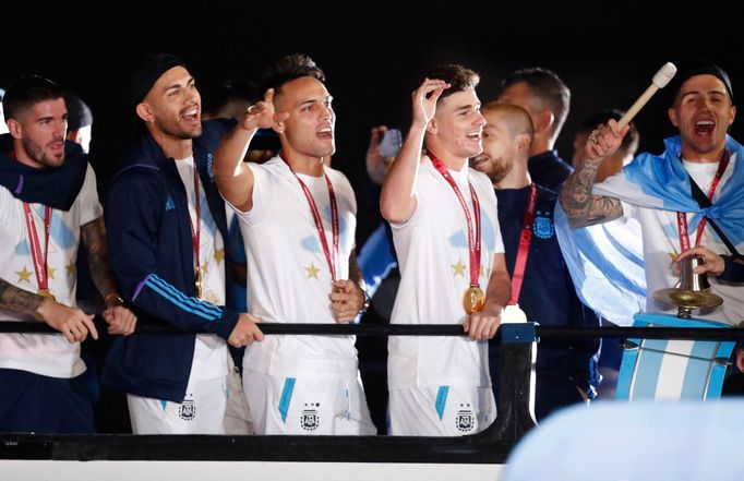 Soccer Football - Argentina team arrives to Buenos Aires after winning the World Cup  - Buenos Aires, Argentina - December 20, 2022 Argentina's Lautaro Martinez and Julia