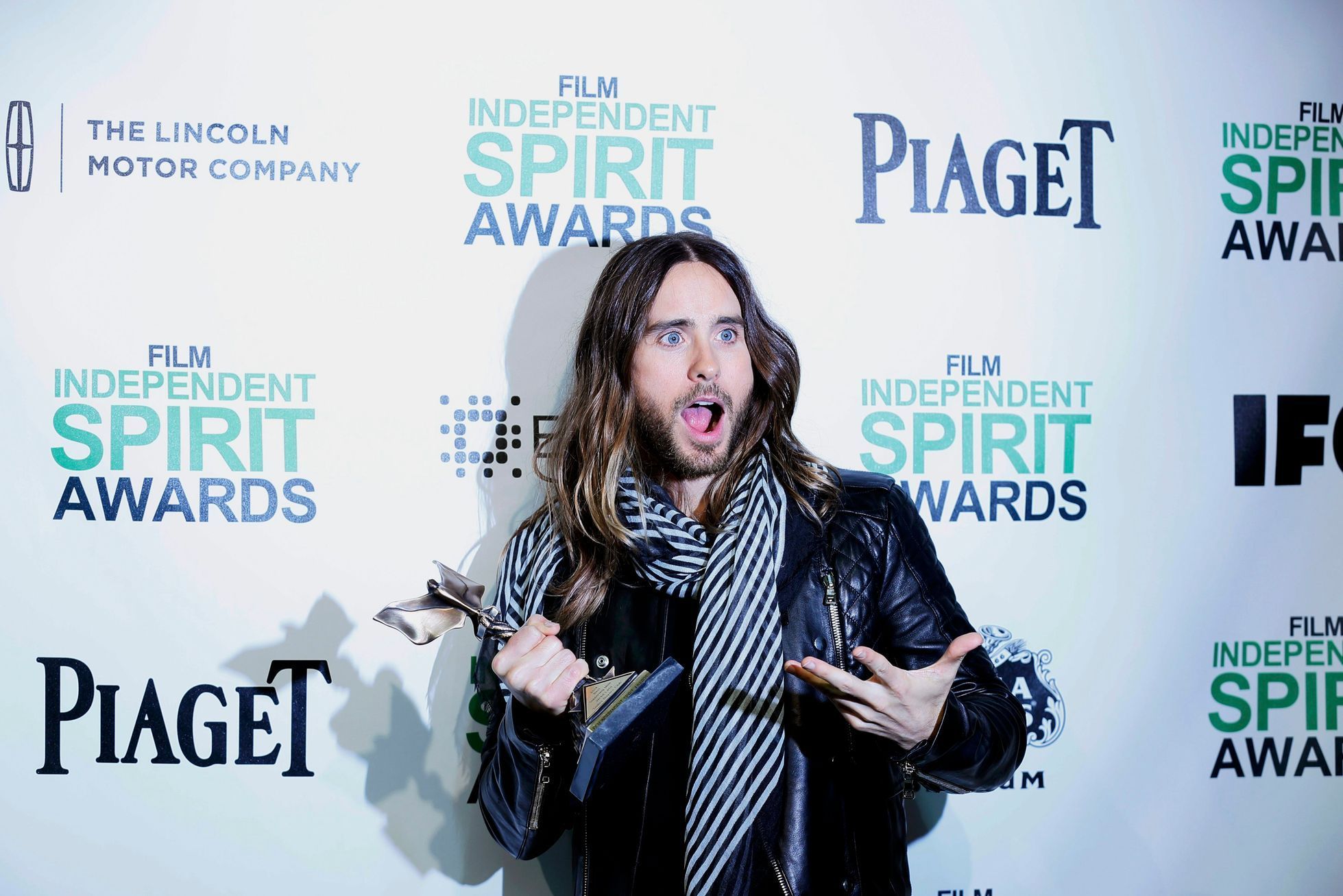 Actor Jared Leto holds his Best Supporting Male award backstage at the 2014 Film Independent Spirit Awards in Santa Monica