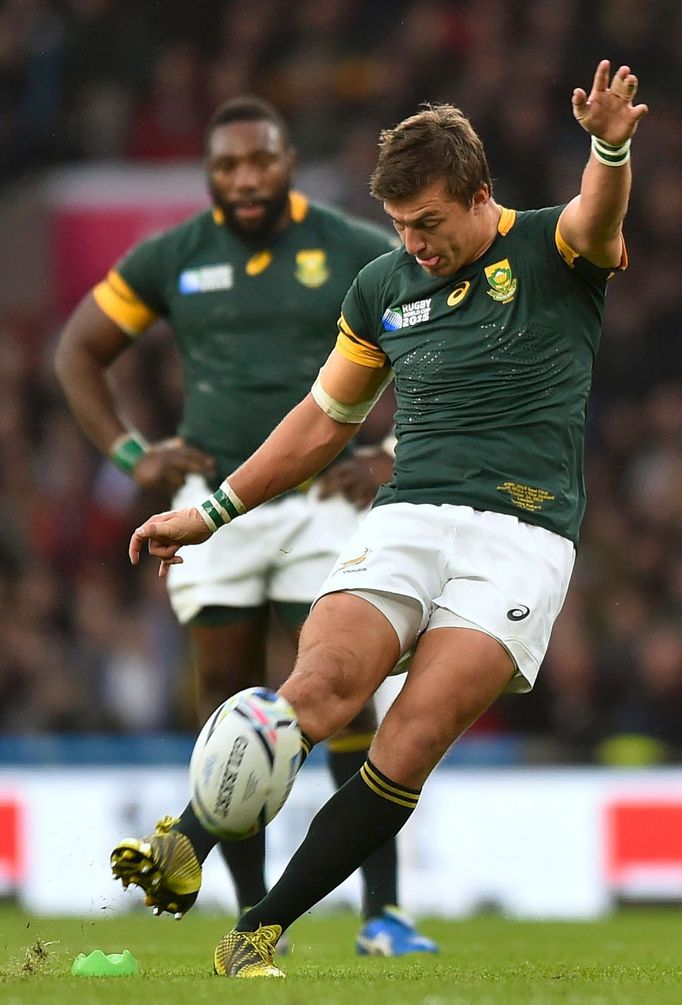 Handre Pollard of South Africa kicks a penalty during their Rugby World Cup semi-final match against New Zealand at Twickenham in London, Britain October 24, 2015. REUTER