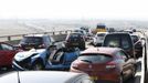 The wreckage of some of the 100 vehicles involved in multiple collisions, which took place in dense fog during the morning rush hour, is seen on the Sheppey Bridge in Kent, east of London