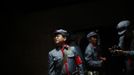 Mid-level government officials dressed in red army uniforms visit an old house where former Chinese leader Mao Zedong used to live, during a five-day training course at the communist party school called China Executive Leadership Academy of Jinggangshan, in Jiangxi province, in this September 21, 2012 file photo. China's Communist Party has dramatically stepped up its training of the country's roughly 40 million party and government officials in the past decade. With public scrutiny of cadre behaviour growing via social media, the party is likely to call for continued, and deepened, cadre education at the upcoming 18th Party Congress. At the vanguard of this education drive, alongside a Central Party School in Beijing, are three "Executive Leadership Academies" which opened in 2005 for middle-ranking and senior officials in Shanghai, Yan'an and Jinggangshan. The curriculum covers Marxism, Leninism and Mao Zedong Thought, but students may also take finance courses, receive in-depth media training or role-play crisis management scenarios on everything from disease outbreaks to train wrecks. REUTERS/Carlos Barria/Files (CHINA - Tags: POLITICS SOCIETY) Published: Zář. 24, 2012, 2:26 odp.