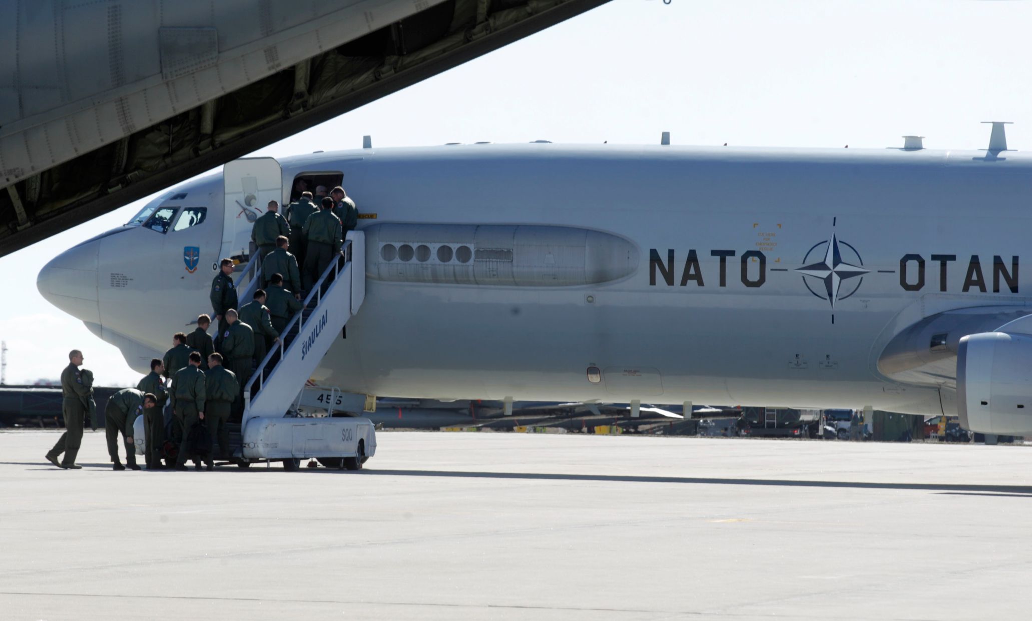 Airmen board a NATO AWACS aircraf during a joint NATO military exercise in Siauliai