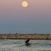 The supermoon rises over the Mediterranean sea at Cabopino beach in southern Spain
