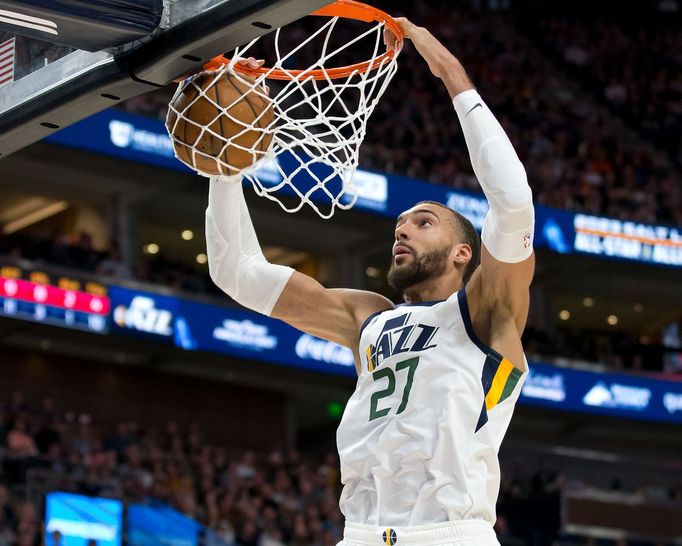 Feb 28, 2020; Salt Lake City, Utah, USA; Utah Jazz center Rudy Gobert (27) dunks the ball during the first half against the Washington Wizards at Vivint Smart Home Arena.