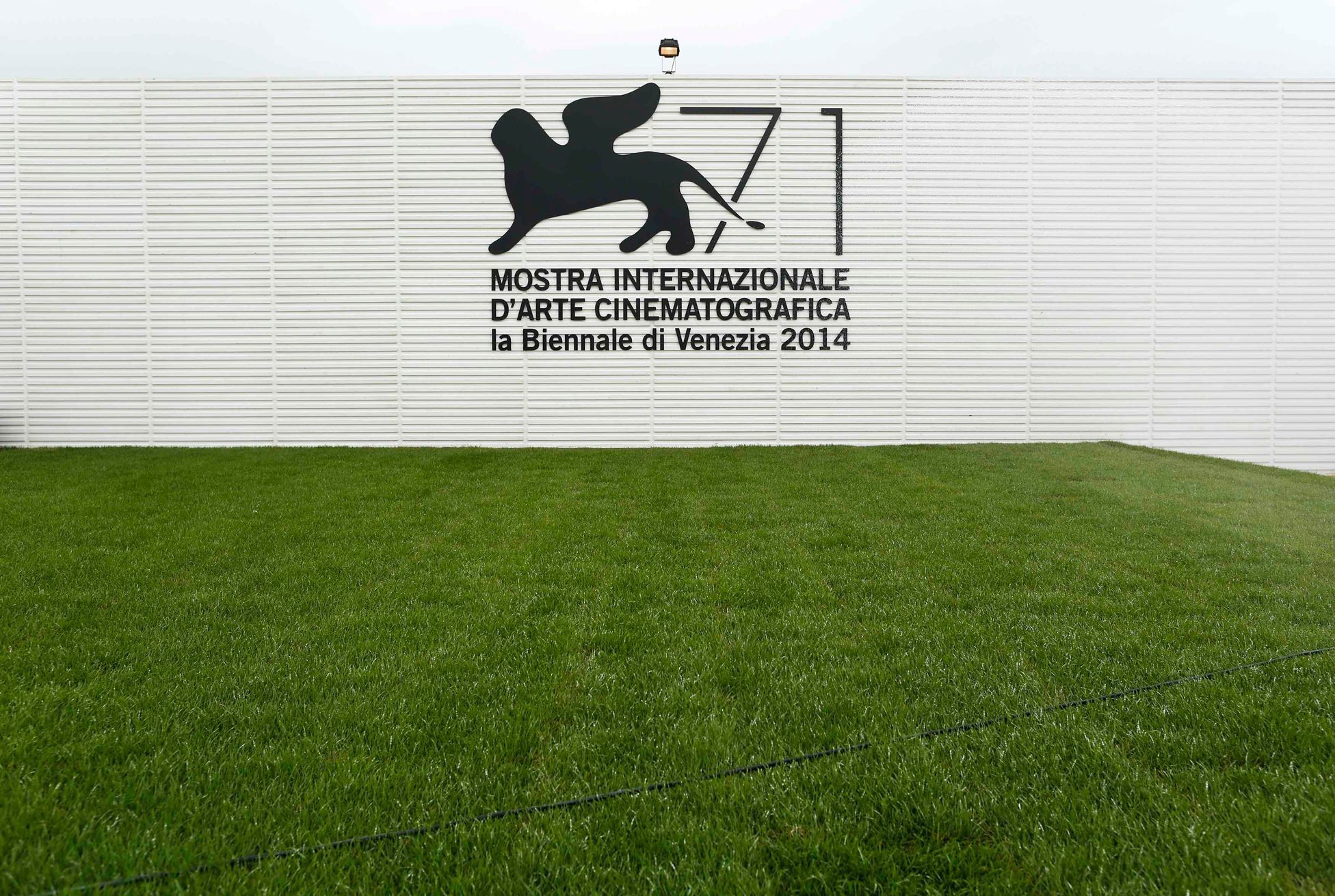 The logo of the 71st Venice Film Festival is seen on a wall in Venice