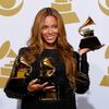 Beyonce holds the awards she won for Best R&amp;B Performance and Best R&amp;B Song for &quot;Drunk in Love&quot; and Best Surround Sound Album for &quot;Beyonce&quot; in the press room at the 57th an