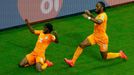 Ivory Coast's Gervinho (L) and Didier Drogba celebrate their goal against Japan during their 2014 World Cup Group C soccer match at the Pernambuco arena in Recife June 14