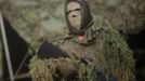 A member of the Brazilian Navy takes on the role of a sniper during an exhibition showcasing their operational capacity to combat terrorist attacks and riots, ahead of the FIFA Confederations Cup and World Youth Day in Rio de Janeiro May 27, 2013. REUTERS/Ricardo Moraes (BRAZIL - Tags: MILITARY SPORT SOCCER CIVIL UNREST) Published: Kvě. 27, 2013, 9:16 odp.