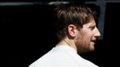 Lotus Formula One driver Romain Grosjean of France looks on during the first practice session of the Australian F1 Grand Prix at the Albert Park circuit in Melbourne Marc