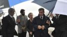 Former French President Nicolas Sarkozy (2nd R) arrives at Air Force Base Waterkloof, Pretoria December 10, 2013, in this handout picture provided by the South African Government Communication and Information System (GCIS).