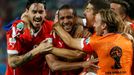 Chile's Jean Beausejour (2nd L) celebrates with his teammates after scoring against Australia during their 2014 World Cup Group B soccer match at the Pantanal arena in Cu