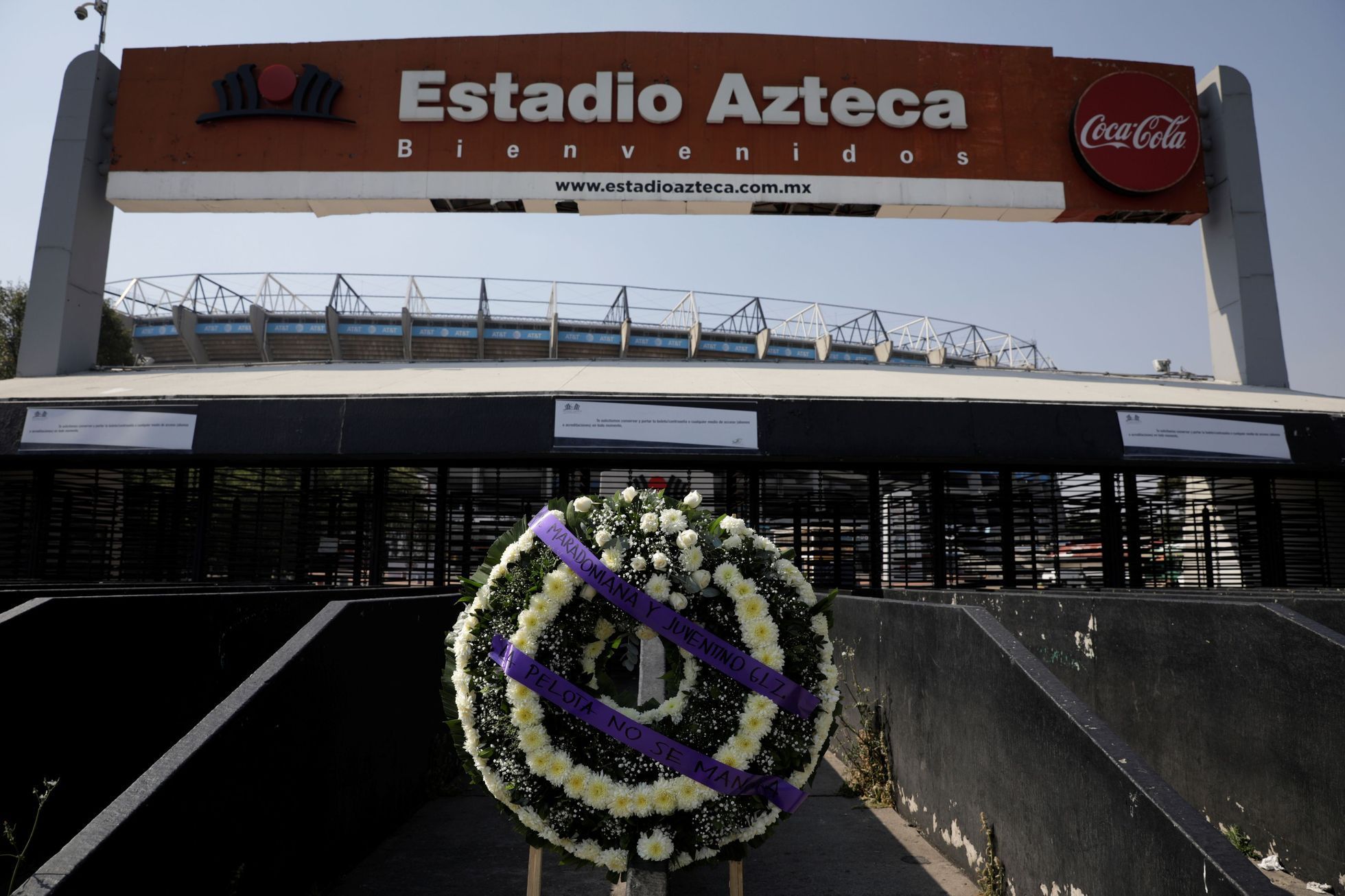 A wreath in memory of late Argentinian soccer legend Diego Armando Maradona is seen at the main access of the Azteca stadium, in Mexico City