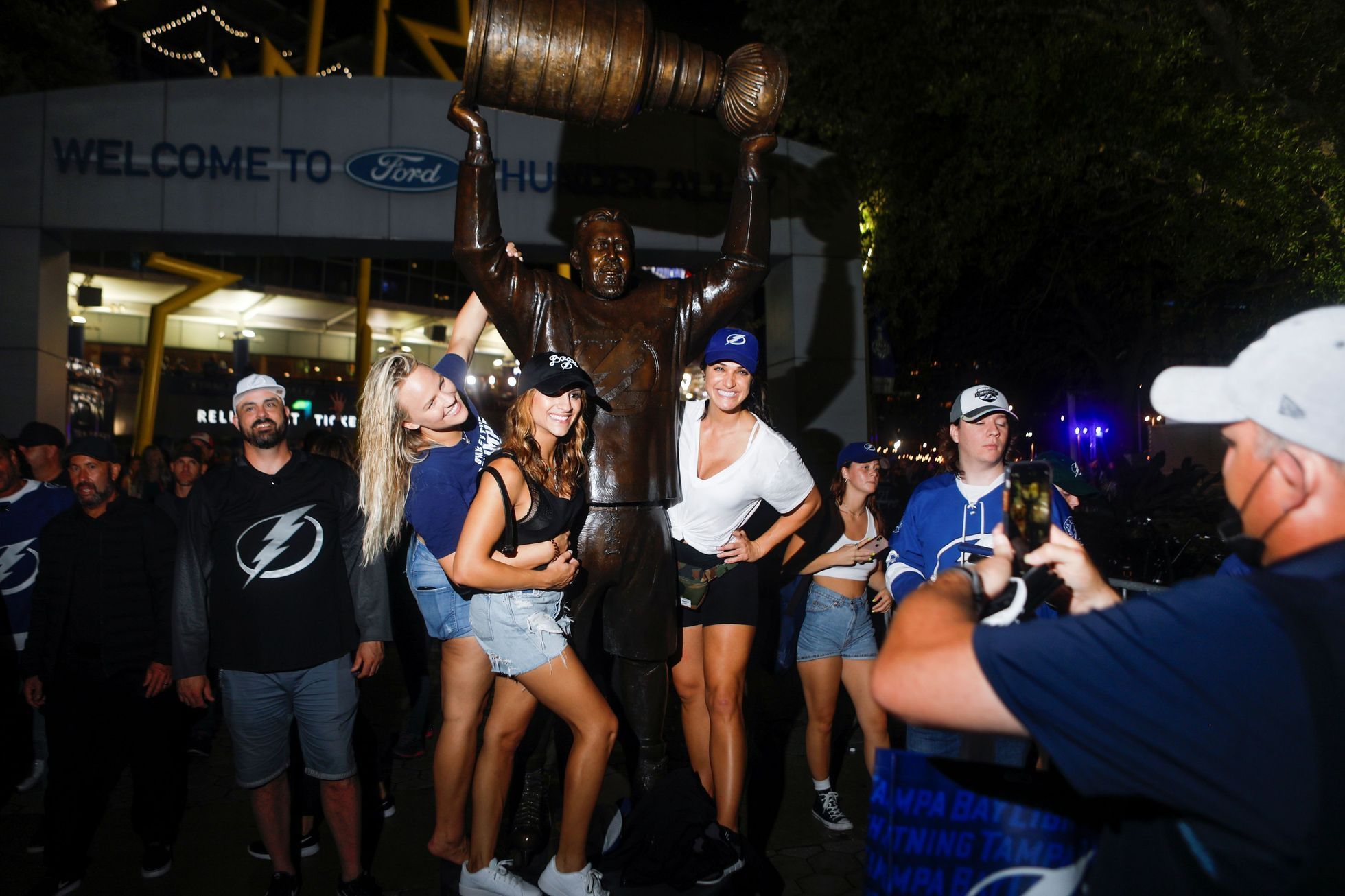 Fans celebrate after the Tampa Bay Lightning ice hockey team won the NHL Stanley Cup Finals over the Montreal Canadiens, in Tampa