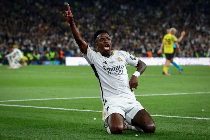 Soccer Football - Champions League - Final - Borussia Dortmund v Real Madrid - Wembley Stadium, London, Britain - June 1, 2024 Real Madrid's Vinicius Junior celebrates sc