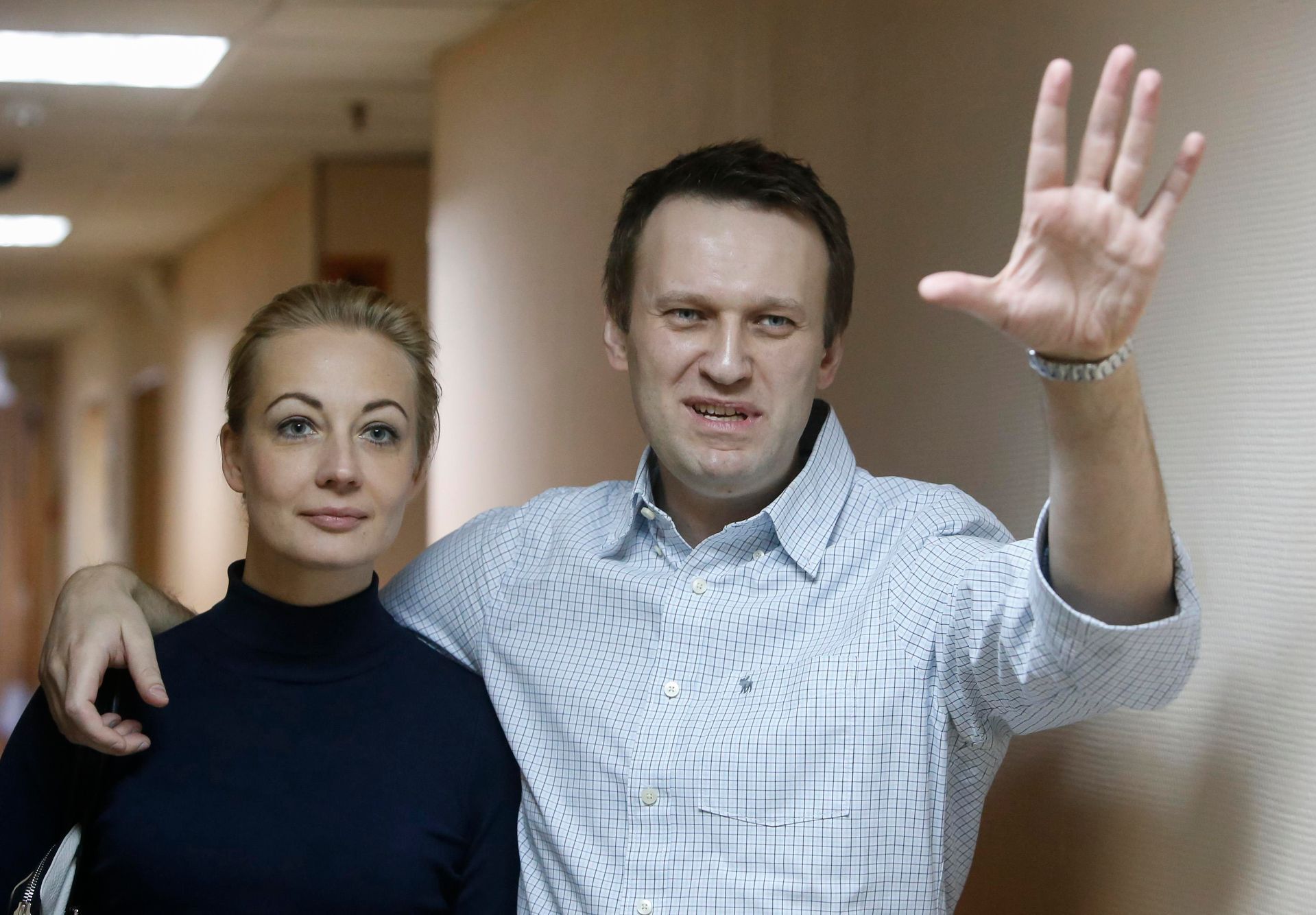 Ruský opoziční bloger Alexej Navalnyj s manželkou.