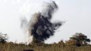 Smoke rises after the Sudanese air force fired a missile during an air strike in Rubkona near Bentiu