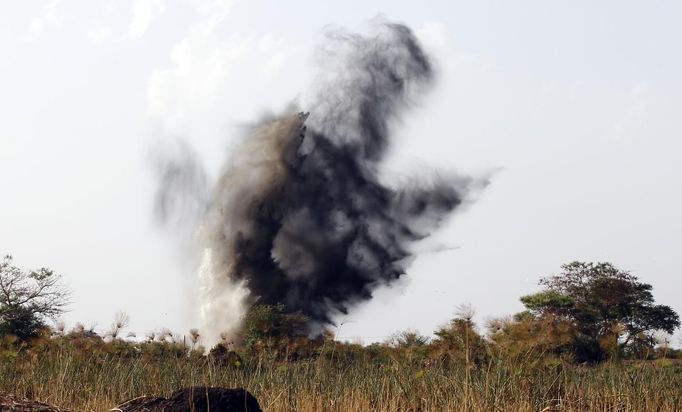 Smoke rises after the Sudanese air force fired a missile during an air strike in Rubkona near Bentiu