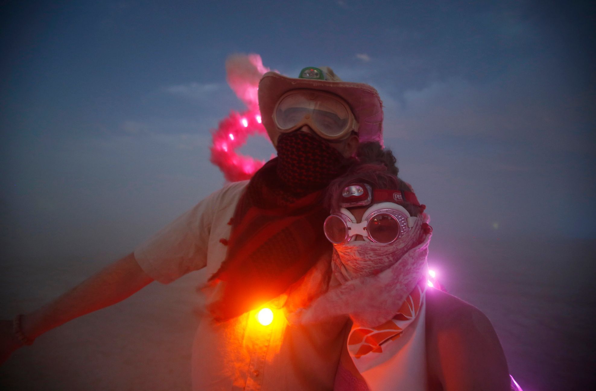 Wade Harrell and his wife Heather Harrell geared up for the dust during the Burning Man 2014 &quot;Caravansary&quot; arts and music festival in the Black Rock Desert of Nevada