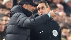 FILE PHOTO: Juergen Klopp remonstrates with fourth official David Coote during Liverpool's Premier League match against Everton