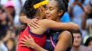 Sep 11, 2021; Flushing, NY, USA; Emma Raducanu of Great Britain (L) hugs Leylah Fernandez of Canada (R) after their match in the women's singles final on day thirteen of