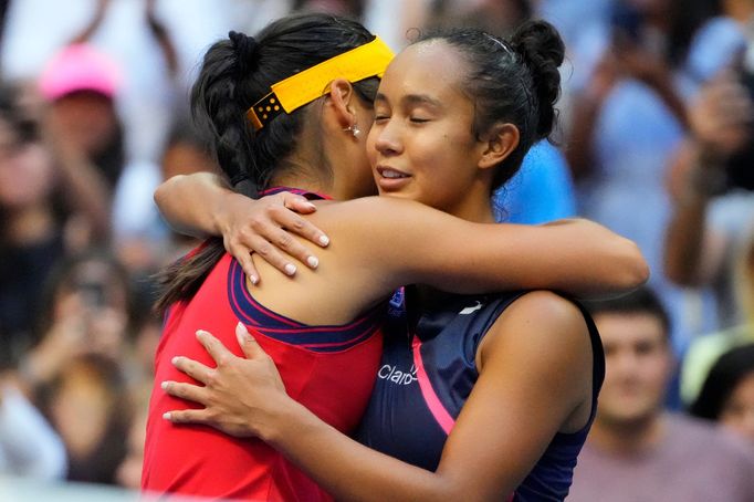 Sep 11, 2021; Flushing, NY, USA; Emma Raducanu of Great Britain (L) hugs Leylah Fernandez of Canada (R) after their match in the women's singles final on day thirteen of