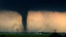 Tornado in Cheyenne, Oklahoma One of over 100 tornadoes reported in the Central Plains during a torando outbreak on Saturday, April 15, 2012. A deadly torando touched down near Woowdard, OK later that night killing 6 and leaving many injured. This dangerous tornado was shot south of Cheyenne, OK. at sunset.