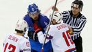 Italy's Daniel Sullivan (L) fights with Norway's Per-Age Skroder (R) during the second period of their men's ice hockey World Championship Group A game at Chizhovka Arena