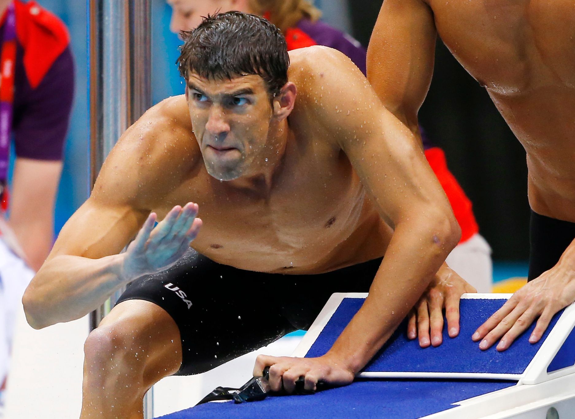 Michael Phelps povzbuzuje Ryana Lochteho na olympiádě v Londýně
