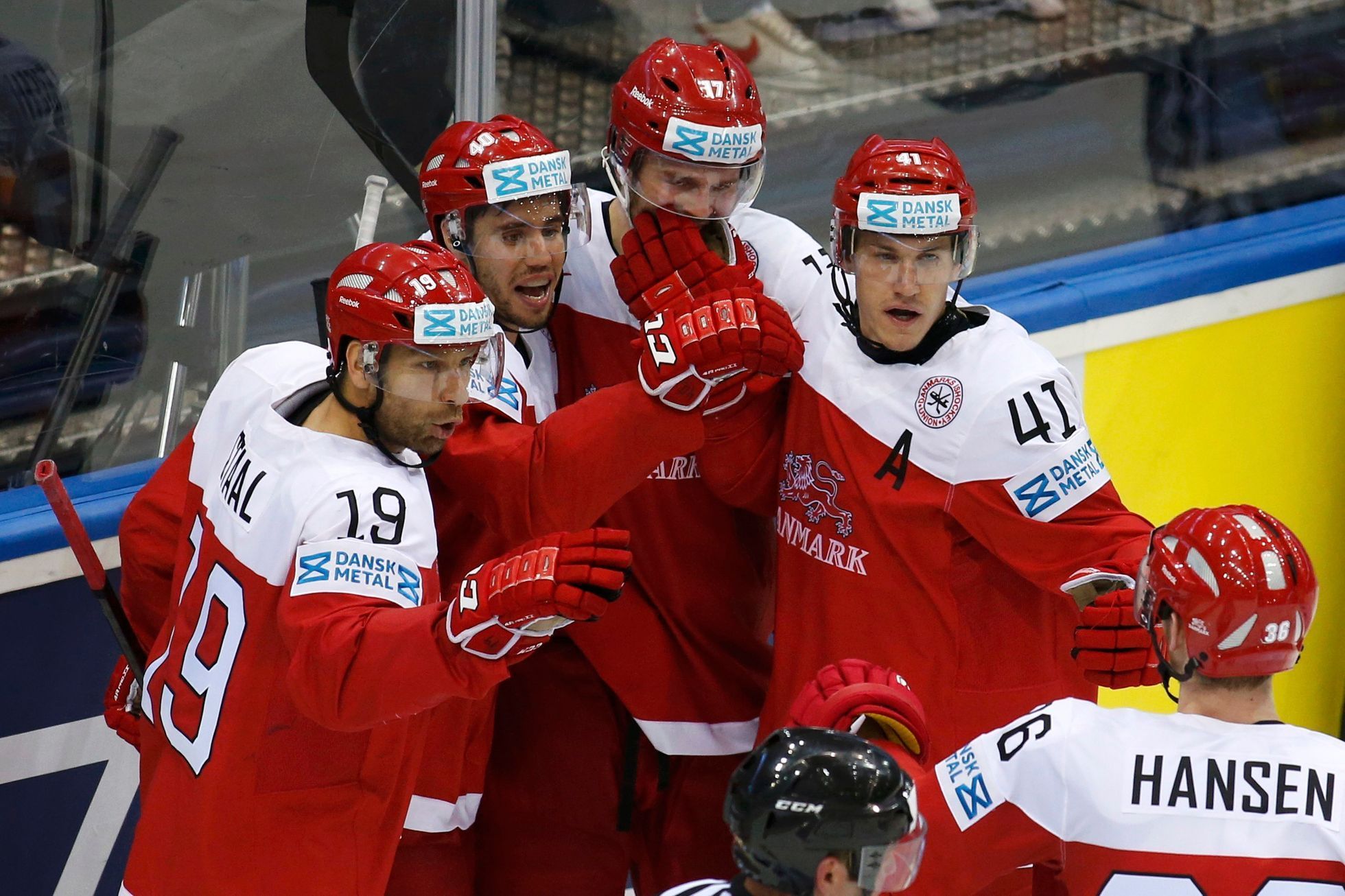 Denmark's Jensen celebrates his goal against the Czech Republic with team mates during the third period of their men's ice hockey World Championship Group A game at Chizhovka Arena in Minsk