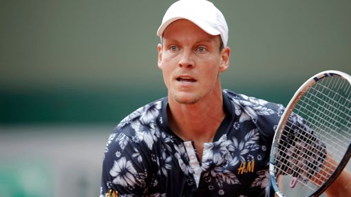 Tomas Berdych of the Czech Republic looks on during his men's singles match against Roberto Bautista Agut of Spain at the French Open tennis tournament at the Roland Garr