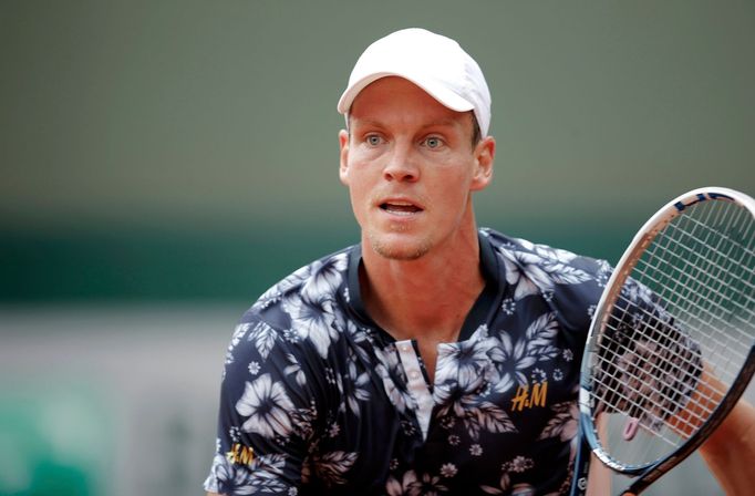 Tomas Berdych of the Czech Republic looks on during his men's singles match against Roberto Bautista Agut of Spain at the French Open tennis tournament at the Roland Garr