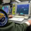 The patch of NATO AWACS (Airborne Warning and Control Systems) aircraft is seen attached to uniform of a controller during surveillance flight over Romania