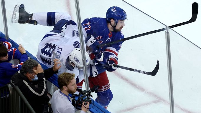 Jun 9, 2022; New York, New York, USA; Tampa Bay Lightning defenseman Erik Cernak (81) is checked into the boards by New York Rangers center Filip Chytil (72) during the t