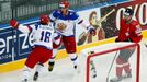 Russia's Sergei Plotnikov (16) celebrates his goal against Switzerland with team mate Alexander Ovechkin (C) as Switzerland's Roman Josi (R) looks on during their men's i