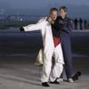Solar Impulse project CEO and pilot Andre Borschberg puts on his suit before take off at Payerne airport May 24, 2012. The Solar Impulse HB-SIA prototype aircraft, which has 12,000 solar cells built into its 64.3 metres (193 feet) wings, attempted its first intercontinental flight from Payerne to Rabat in Morocco with a few days for a technical stop and a change of pilot in Madrid. This flight will act as a final rehearsal for the 2014 round-the-world flight. REUTERS/Denis Balibouse (SWITZERLAND - Tags: TRANSPORT SCIENCE TECHNOLOGY SOCIETY BUSINESS) Published: Kvě. 24, 2012, 8:10 dop.