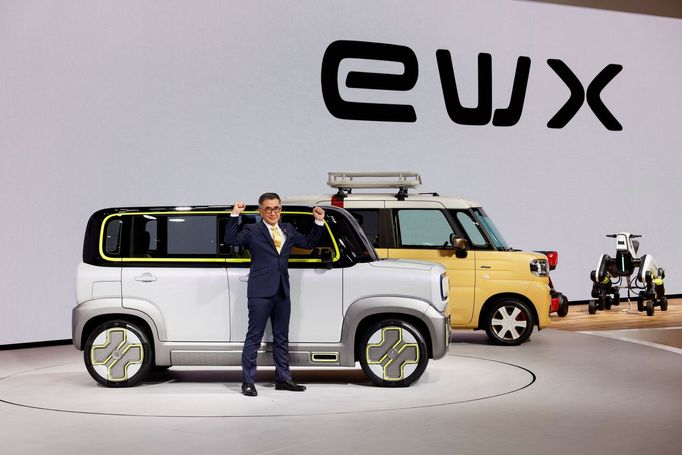 President and Representative Director at Suzuki Motor Corporation Toshihiro Suzuki unveils the Suzuki eWX at a press day of the Japan Mobility Show 2023 at Tokyo Big Sigh