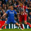 Chelsea's Hazard is fouled by Atletico's Suarez during their Champions League semi-final second leg soccer match at Stamford Bridge in London