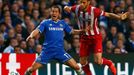 Chelsea's Eden Hazard (L) is fouled by Atletico's Mario Suarez during their Champions League semi-final second leg soccer match at Stamford Bridge in London, April 30, 20