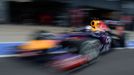 Red Bull Formula One driver Sebastian Vettel of Germany drives out of the pit lane during qualifying for the British Grand Prix at the Silverstone Race circuit, central E