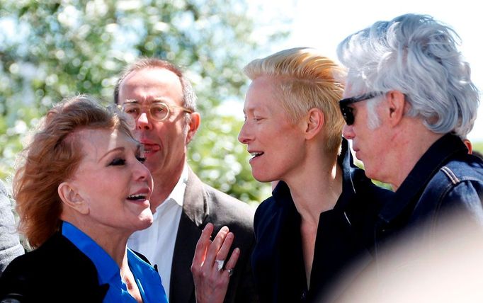 Tilda Swinton (2ndR) and director Jim Jarmusch (R) speak with actress Kim Novak