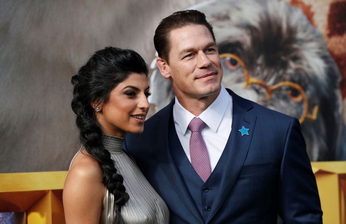 Cast member John Cena and girlfriend Shay Shariatzadeh pose at the premiere for the film "Dolittle" in Los Angeles, California, U.S., January 11, 2020. REUTERS/Mario Anzu