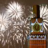 Fireworks light the sky over the Kremlin's Spasskaya Tower, covered by scaffolding, during celebrations of New Year's Day in Red Square in Moscow