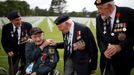 WWII D-Day veterans, including Richard Llewellyn and Mervyn Kersh from Britain and Norman Duncan from the U.S., attend a ceremony at Normandy