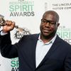 Director Steve McQueen poses backstage with his Best Feature award for the film &quot;12 Years a Slave&quot; at the 2014 Film Independent Spirit Awards in Santa Monica
